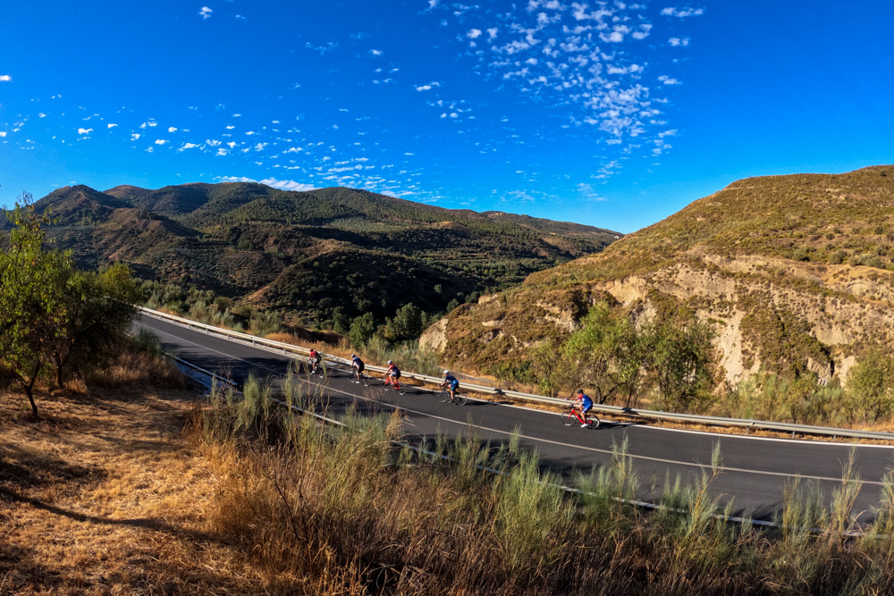 Guests tackling a memorable climb surrounded by spectacular scenery.