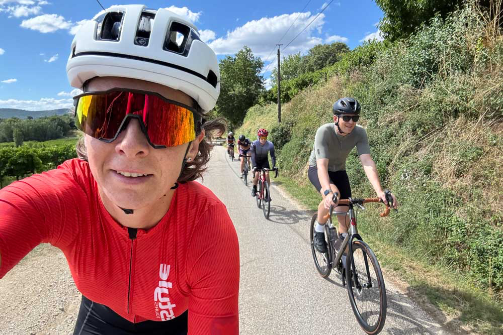 Bikestyle Tours guide riding with guests on a cycling tour