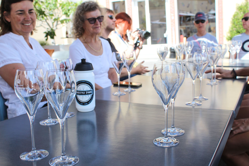 Guests enjoying a wine tasting experience during a cycling holiday