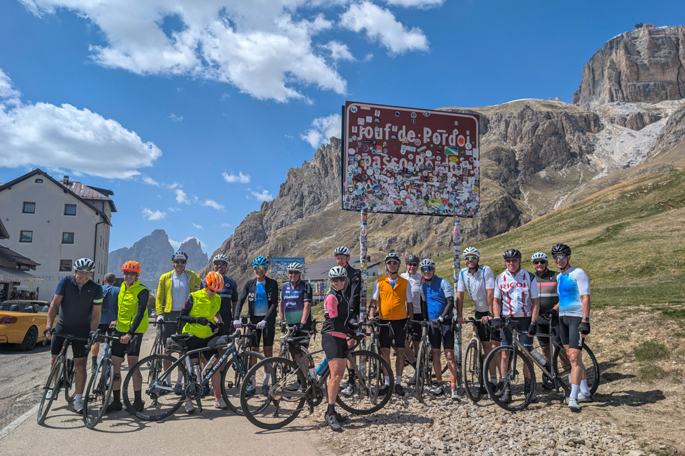 Cyclists at Passo Pordoi in the Dolomites