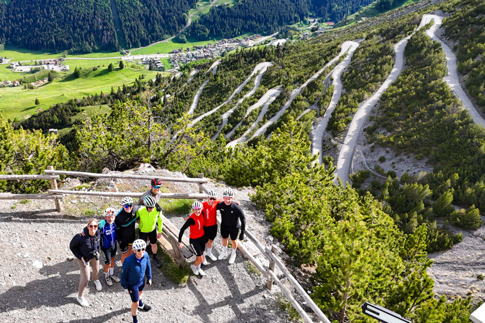 Cyclists overlooking the Piccolo Stelvio switchbacks